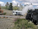 Steam locomotive about to obscure an RV